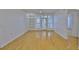 Bright living room with hardwood floors, ceiling fan and built-in shelving at 2201 Bay Club Cir, Tampa, FL 33607