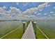 Scenic view from the pier overlooking the water, providing a serene and picturesque setting at 2201 Bay Club Cir, Tampa, FL 33607