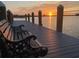 Sunset view from the pier showcasing tranquil water and gorgeous sunset skies at 2201 Bay Club Cir, Tampa, FL 33607