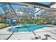 Beautiful screened-in pool with integrated spa and attractive backyard, perfect for outdoor entertaining at 2515 Pemberton Creek Dr, Seffner, FL 33584