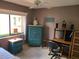Cozy bedroom showcasing a built-in desk and soft natural lighting at 2588 Laurelwood Dr # 16A, Clearwater, FL 33763