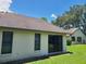 The exterior features a sliding glass door and windows at 2588 Laurelwood Dr # 16A, Clearwater, FL 33763