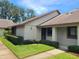 Charming home exterior with landscaped front yard and inviting entryway at 2588 Laurelwood Dr # 16A, Clearwater, FL 33763