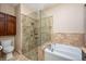 Bathroom featuring a walk-in shower and soaking tub at 27652 Sky Lake Cir, Wesley Chapel, FL 33544
