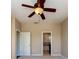 Bedroom with neutral carpet and adjoining bathroom at 27652 Sky Lake Cir, Wesley Chapel, FL 33544