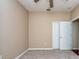 Neutral bedroom with carpet, ceiling fan, standard closet and a single window at 27652 Sky Lake Cir, Wesley Chapel, FL 33544