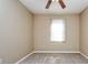 Bedroom with neutral carpet and window at 27652 Sky Lake Cir, Wesley Chapel, FL 33544