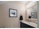 Elegant powder room showcases modern vanity with marble countertop and stylish fixtures at 2804 Countryside Blvd # 4, Clearwater, FL 33761