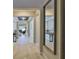 Spacious hallway featuring tile flooring and decor, leading to other rooms in the house at 2866 Quail Crest Ct, Valrico, FL 33594