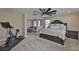 Main bedroom with workout equipment and cozy sitting area located off to the side at 2866 Quail Crest Ct, Valrico, FL 33594