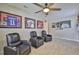 Personal Cave featuring framed sports jerseys and comfortable recliner seating for relaxing and watching games at 2866 Quail Crest Ct, Valrico, FL 33594