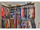 Spacious walk-in closet boasts custom shelving, hanging rods and drawers for optimal organization at 2866 Quail Crest Ct, Valrico, FL 33594