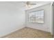 Comfortable bedroom with a ceiling fan and ample natural light from the window at 3111 W De Leon St # 9, Tampa, FL 33609
