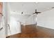 Spacious living room featuring hardwood floors, natural light, and staircase at 3111 W De Leon St # 9, Tampa, FL 33609