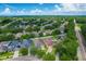 Beautiful aerial view of a residential community surrounded by mature trees at 320 Roxbury Crossing Ct, Valrico, FL 33594