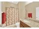 Bathroom featuring granite countertop, decorative shower curtain, and neutral wall color at 320 Roxbury Crossing Ct, Valrico, FL 33594