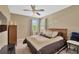 Comfortable bedroom featuring a ceiling fan, neutral walls, a window, and carpet at 320 Roxbury Crossing Ct, Valrico, FL 33594