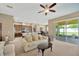 Bright living room that connects to the kitchen and outdoor patio area at 320 Roxbury Crossing Ct, Valrico, FL 33594