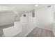 Bonus room area features built-in steps, carpeting, and natural light at 3513 Syracuse St, Port Charlotte, FL 33952