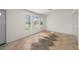 Bright room with large windows, tiled floors, and natural light at 3513 Syracuse St, Port Charlotte, FL 33952