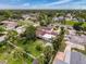 An aerial view showcases the property's landscaping, nearby street, and neighborhood at 425 49Th N St, St Petersburg, FL 33710