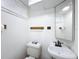 Small bathroom with toilet and sink at 425 49Th N St, St Petersburg, FL 33710