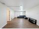 Spacious living room with hardwood floors, neutral paint, and natural light at 425 49Th N St, St Petersburg, FL 33710