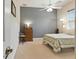 Bedroom with neutral walls, ceiling fan, and a light-filled window at 4428 Gevalia Dr, Brooksville, FL 34604