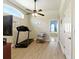 Exercise room with a treadmill and plenty of space at 4428 Gevalia Dr, Brooksville, FL 34604