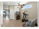 Exercise room with a treadmill and television at 4428 Gevalia Dr, Brooksville, FL 34604