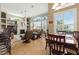 Open concept living space with adjoining dining area and abundant natural light at 4428 Gevalia Dr, Brooksville, FL 34604