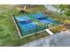 Overhead view of fenced community pickleball courts, perfect for active residents and outdoor fun at 4428 Gevalia Dr, Brooksville, FL 34604