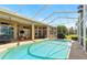 Backyard view of an inviting pool and lanai area, perfect for outdoor enjoyment at 4428 Gevalia Dr, Brooksville, FL 34604