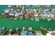 Beautiful aerial view of waterfront homes with docks on canals, a boater's paradise offering easy access to the water at 501 Crystal Dr, Madeira Beach, FL 33708