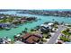 Waterfront homes offer easy water access, boat docks and stunning water views near the city at 501 Crystal Dr, Madeira Beach, FL 33708