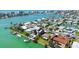 Waterfront community with canal access, private docks, and scenic views of the surrounding area at 501 Crystal Dr, Madeira Beach, FL 33708