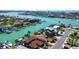 Waterfront homes offer easy water access, boat docks and stunning water views near the city at 501 Crystal Dr, Madeira Beach, FL 33708