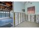 Garage and interior room featuring a window and showing water damage at 501 Crystal Dr, Madeira Beach, FL 33708