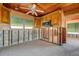Kitchen area with overhead cabinets and tiled flooring showing flood damage at 501 Crystal Dr, Madeira Beach, FL 33708