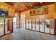Kitchen area with wooden cabinets and tiled flooring showing flood damage at 501 Crystal Dr, Madeira Beach, FL 33708