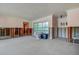 Partially renovated living room featuring a new toilet awaiting completion at 501 Crystal Dr, Madeira Beach, FL 33708