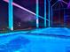 An indoor pool has an enclosed screen and city view at 5307 Wishing Arch Dr, Apollo Beach, FL 33572