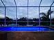 Enclosed pool with fountains and pavers at 5307 Wishing Arch Dr, Apollo Beach, FL 33572