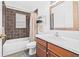 Bathroom featuring a tub, shower and vanity at 5422 Braddock Dr, Zephyrhills, FL 33541