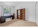 Bedroom featuring a built-in desk, storage and window at 5422 Braddock Dr, Zephyrhills, FL 33541