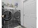 A laundry room featuring a washer and dryer at 5422 Braddock Dr, Zephyrhills, FL 33541