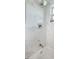 Marble-themed bathroom with a showerhead at 5741 91St N Ave, Pinellas Park, FL 33782