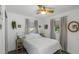 Bedroom featuring a window, and decorative wall art at 5741 91St N Ave, Pinellas Park, FL 33782