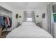 Bedroom featuring a window, and a closet with visible hanging clothes at 5741 91St N Ave, Pinellas Park, FL 33782
