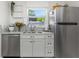 Modern kitchen with stainless steel appliances, stylish countertops, and ample storage at 5741 91St N Ave, Pinellas Park, FL 33782